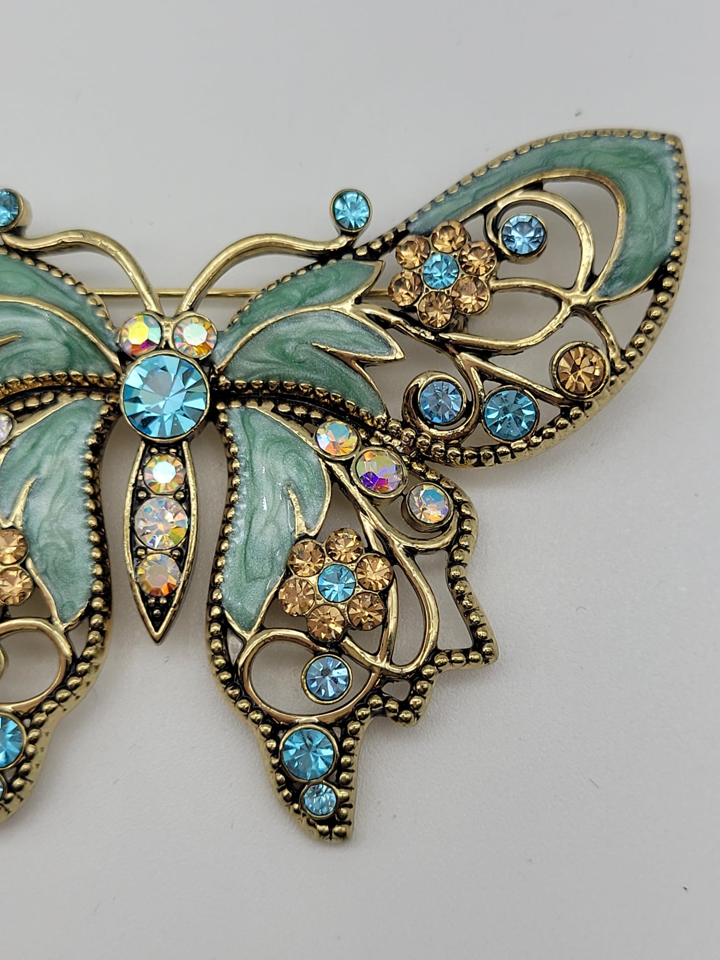 Vintage Nina Ricci Avon Brooch with Aqua, Pink, and Blue Rhinestones